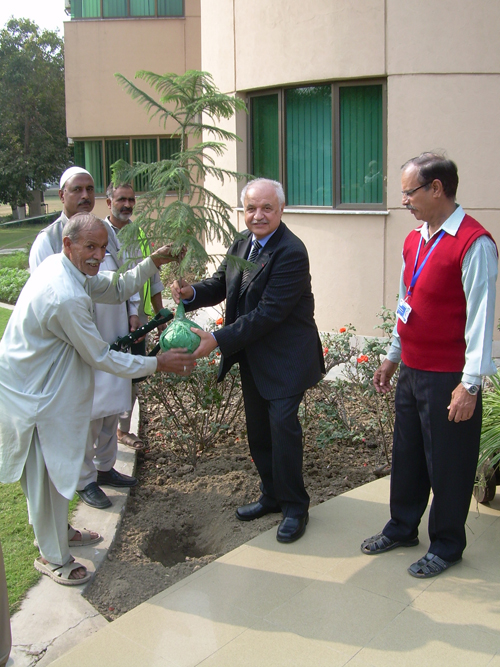 Mr. Talal Abu-Ghazaleh planting a tree in the garden of ...