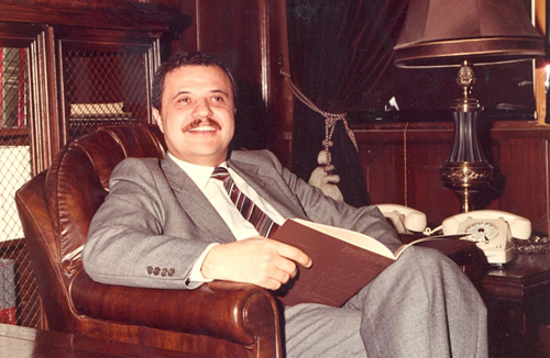 Abu-Ghazaleh reading in his office, Kuwait, 1982