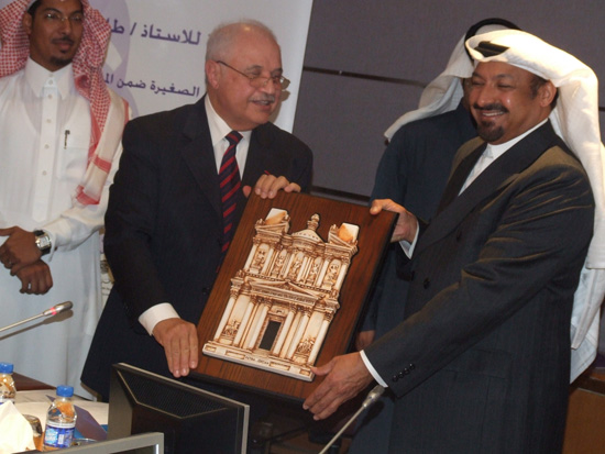A gift is presented from Mr. Talal Abu-