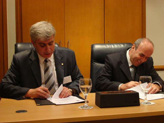 Signing of an agreement between the Talal Abu-Ghazaleh ...